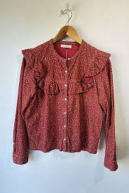 Long-sleeved red floral blouse